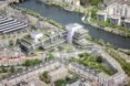 a bird's-eye view of the new Rivierstaete building, showing the city, trees and river. the new building features green rooftops