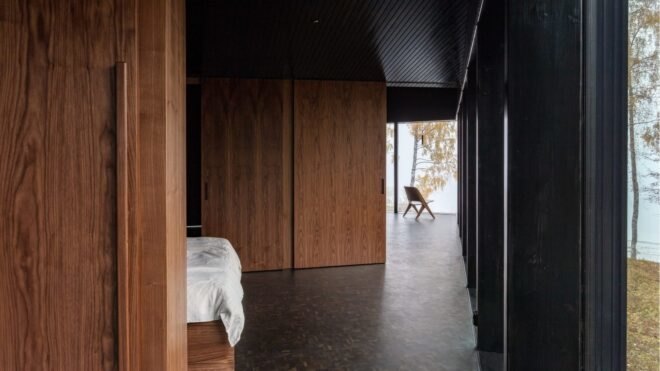 room leading into bedroom with open doors