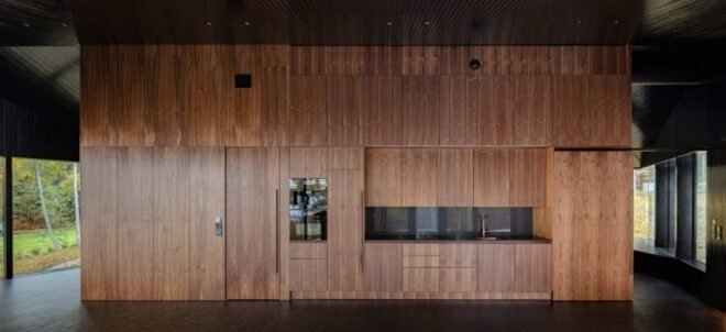 interior space with honey-toned wood walls