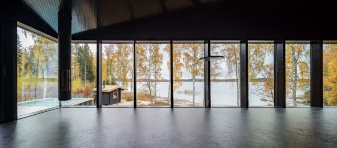 an interior space lined with large windows