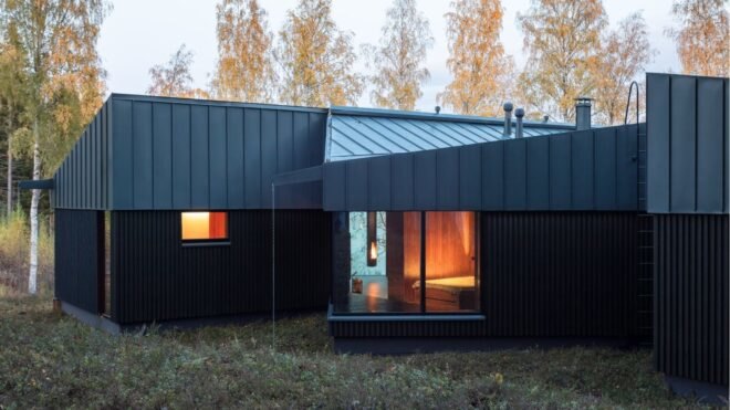 a timber and zinc home with angular roof
