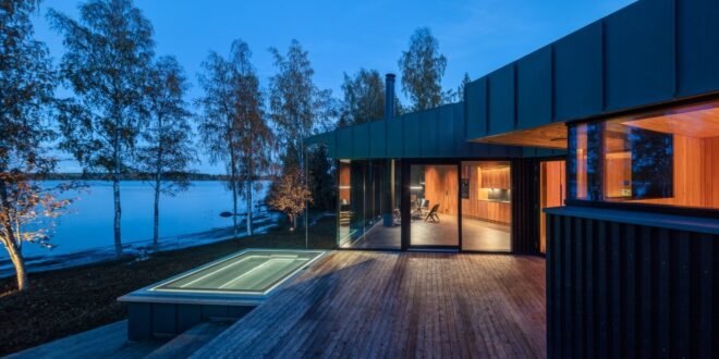 a wooden deck with sunken tub