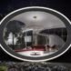 large round window looking into interior living space