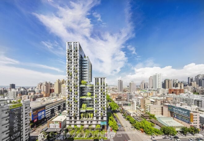 white, plant-covered tower in a city