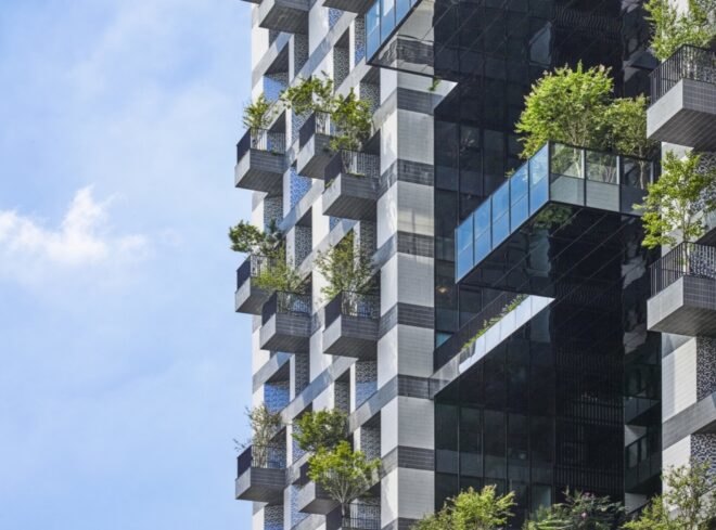 balconies covered in plants jutting out from a tower