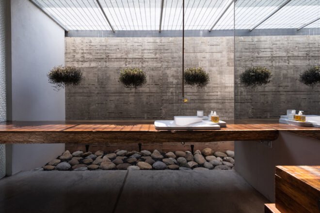 spa-inspired bathroom with wooden counter and sink
