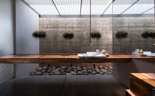 spa-inspired bathroom with wooden counter and sink