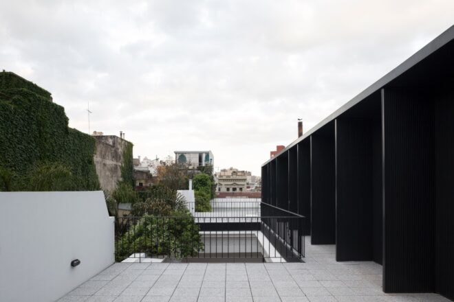 open-air patio space near black structure