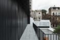 black building with outdoor patio