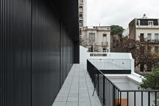 black building with outdoor patio