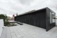 elongated structure with black cladding