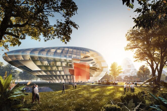 a tear-drop shaped building surrounded by greenery