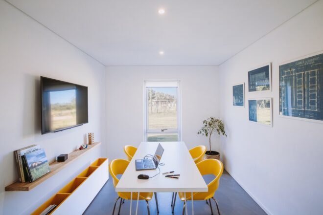 white dining table with yellow chairs