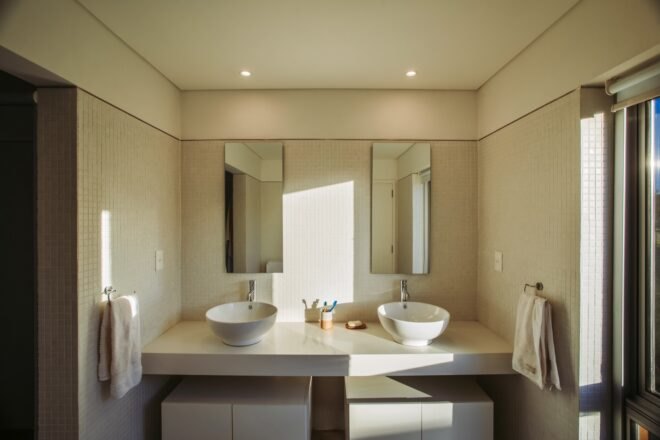 bathroom with two sinks and two mirrors