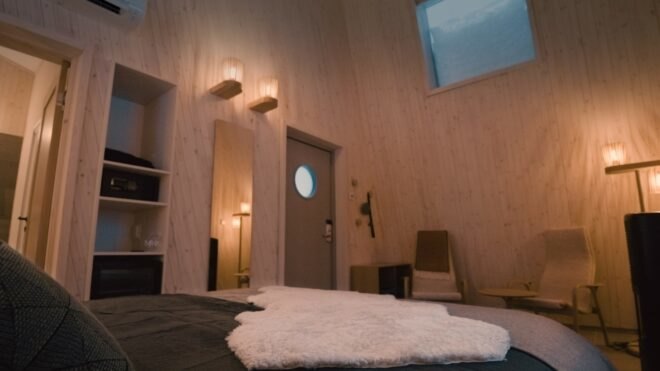 a bedroom suite with windows