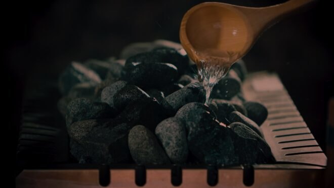 closeup shot of bucket of spa rocks