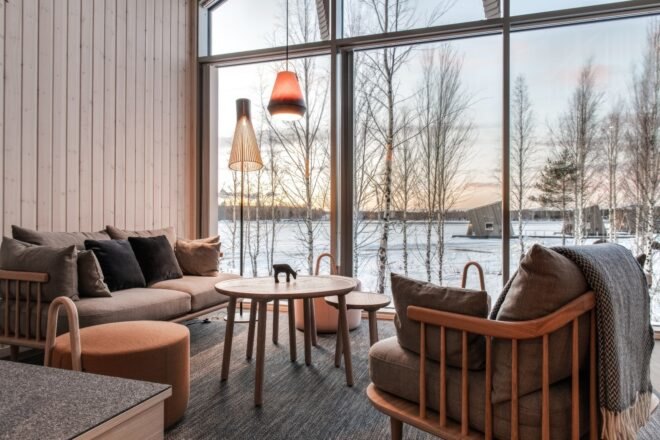 a warm living space with large glass wall