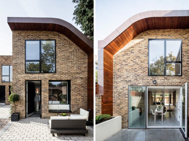 On the left side, outdoor furniture on patio beside brick home. On right, glass doors of brick home opening to outdoor patio.