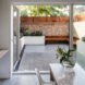 white dining table near open glass door