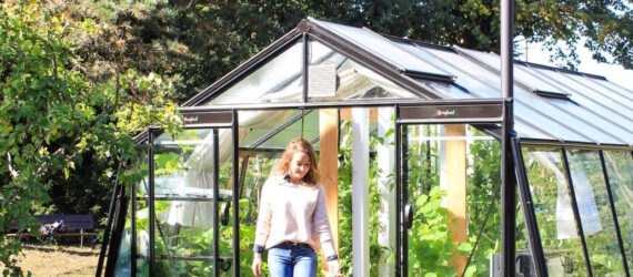 person leaving a greenhouse