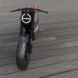 front view of gray and orange hybrid motorcycle