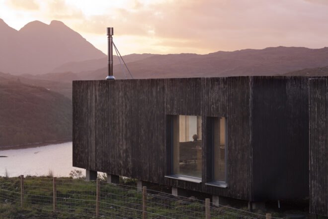 elongated timber home looking out over landscape