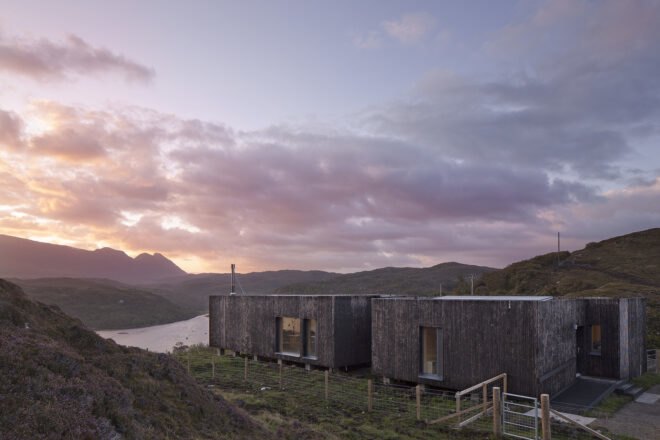 elongated timber home looking out over landscape