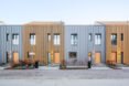 steel and wood homes with angled roofs