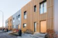 steps and bikes in front of wood and steel homes