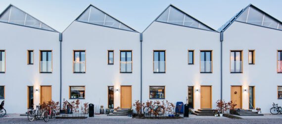 white homes with sawtooth roofline
