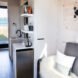 mini kitchen and living space inside tiny home