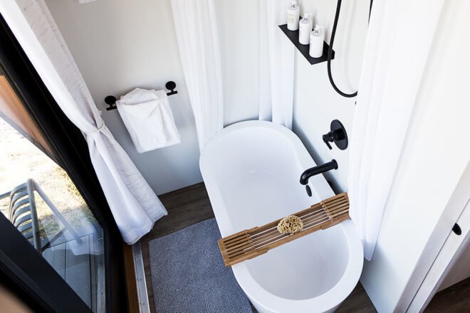 soaking tub inside white bathroom