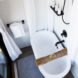 soaking tub inside white bathroom