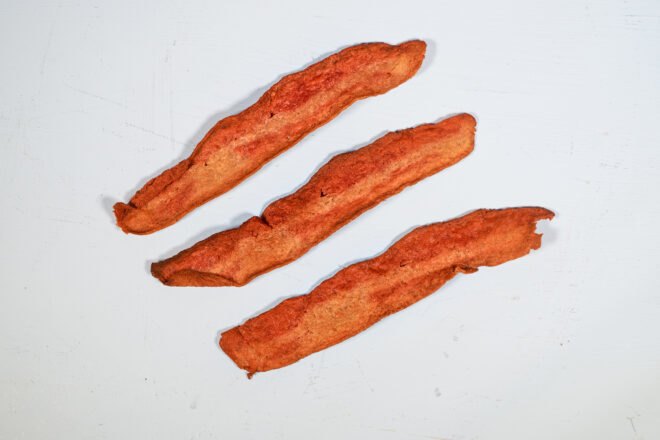 meatless bacon on gray background