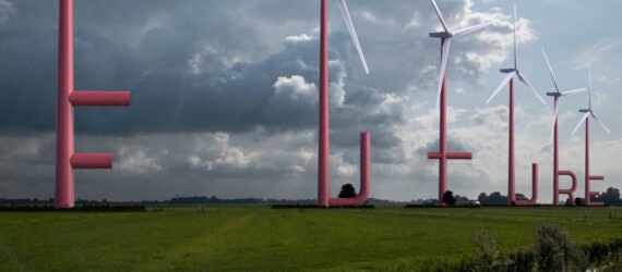 red wind turbines spelling out the word 