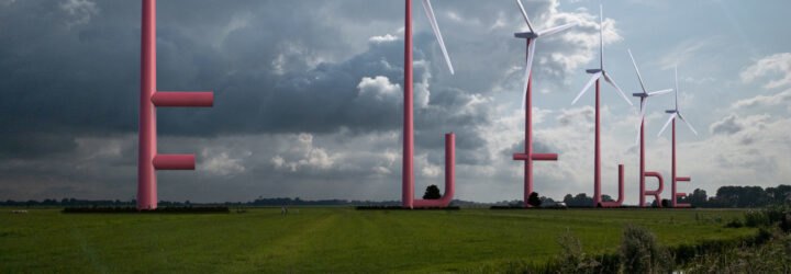 red wind turbines spelling out the word 