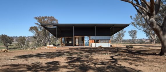 low-lying home with extended roof