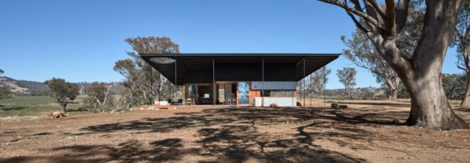 low-lying home with extended roof