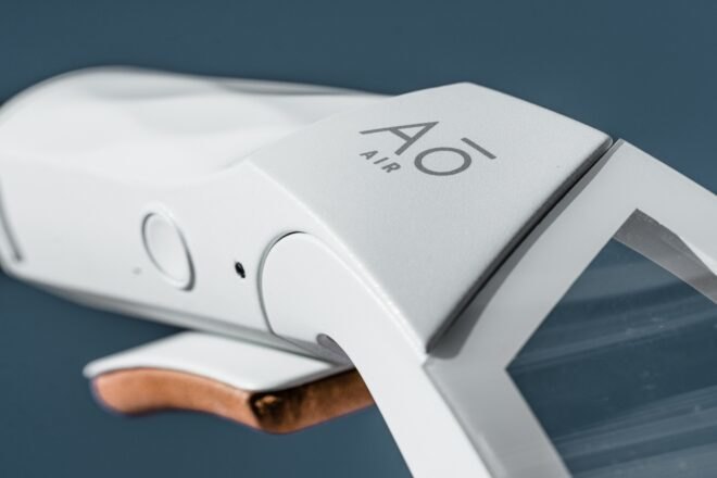 white plastic object with AO written on it