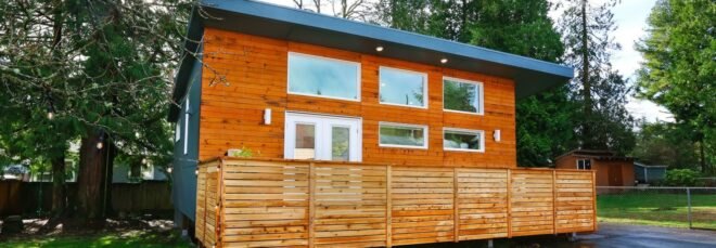 tiny home clad in honey-toned wood