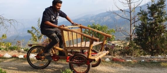 person riding a bamboo bike