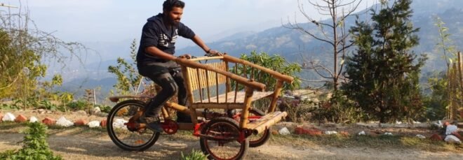 person riding a bamboo bike