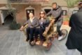 couple being transported by bamboo bike