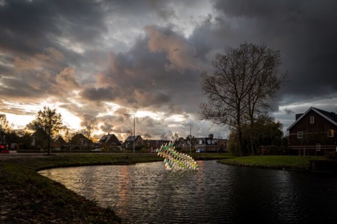 3d-printed bunny sculpture glowing with rainbow LED lights