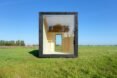 black cabin with glass doors