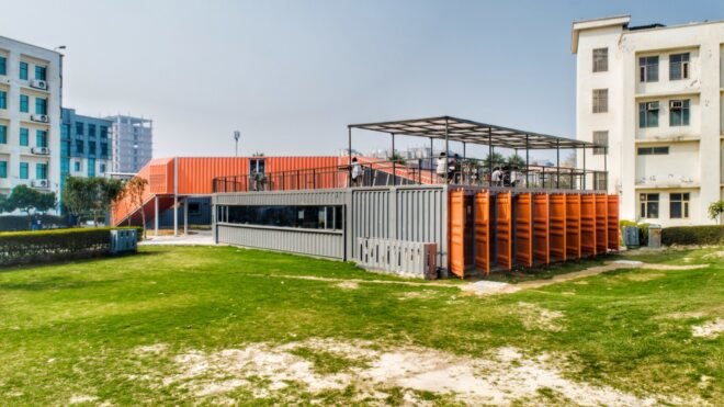gray and orange shipping container building