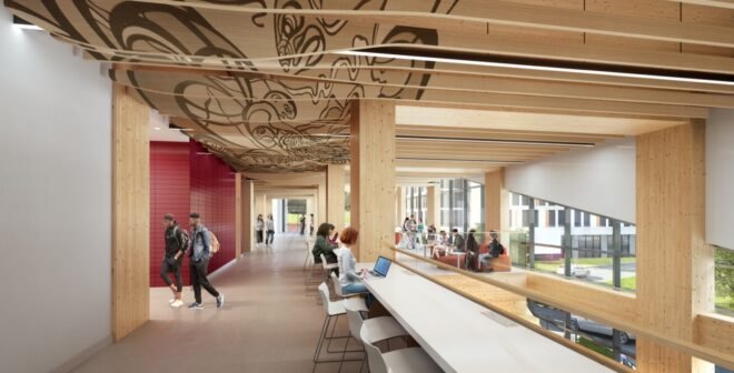 white desks under a patterned wood ceiling