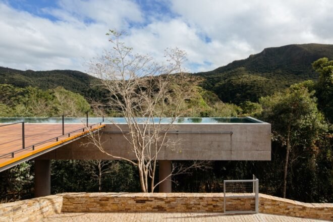 view of home's large pool inside a concrete shell