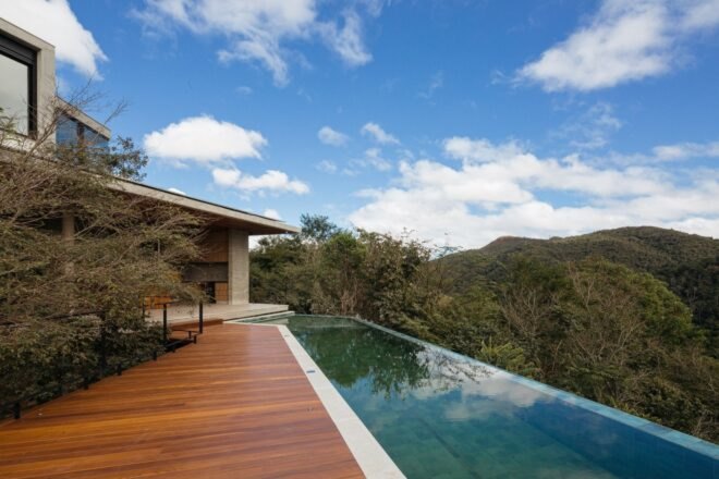 view of infinity pool looking out over view