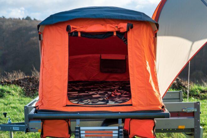 opening of orange tent